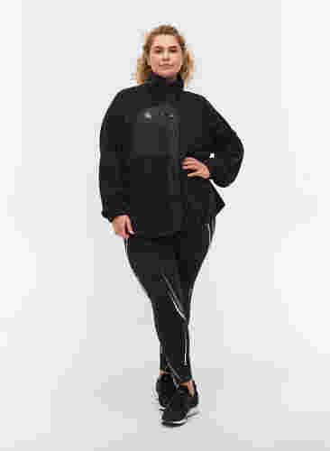 Sportsjakke i fleece med høj krave og lommer, Black, Model image number 3