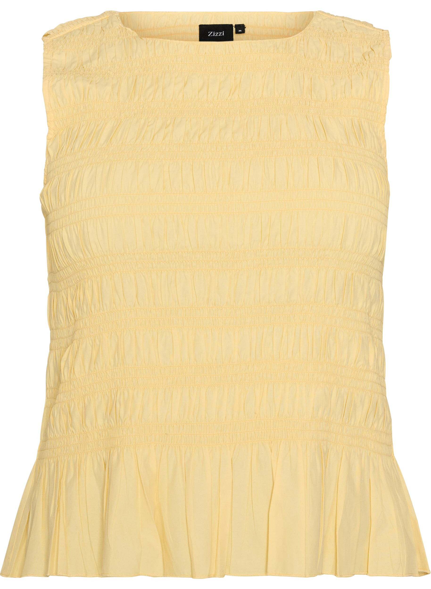 Smocktop med b&aring;dudsk&aelig;ring og peplumkant