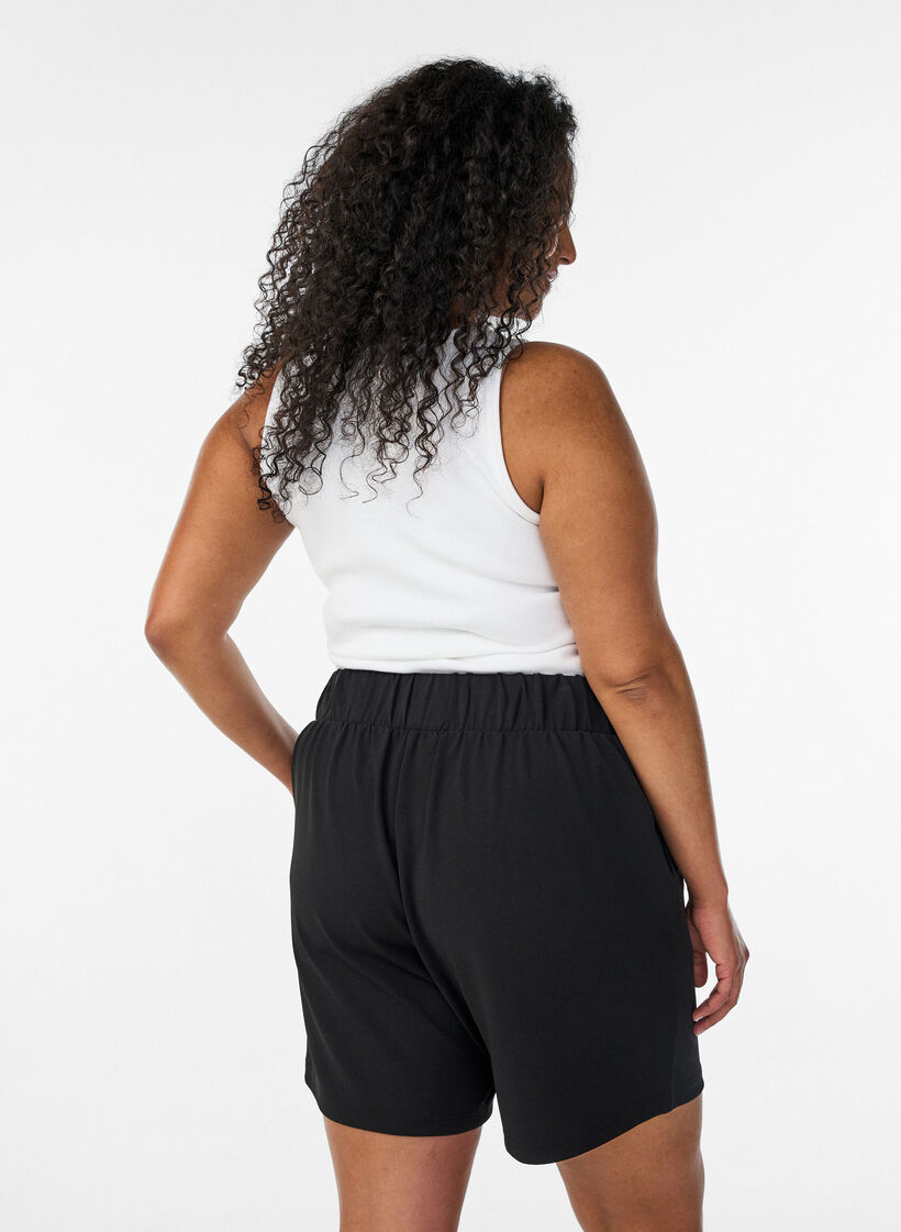 Shorts med lommer og l&oslash;s pasform, Sort, Model image number 2