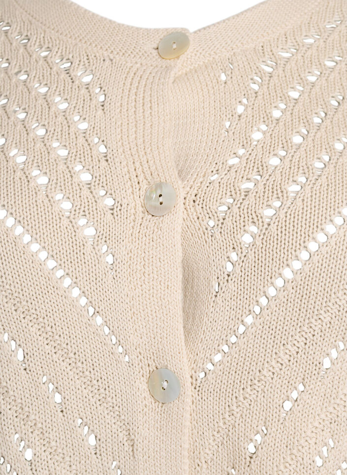 Kort strikcardigan med hulmønster, Sandshell, Packshot image number 2