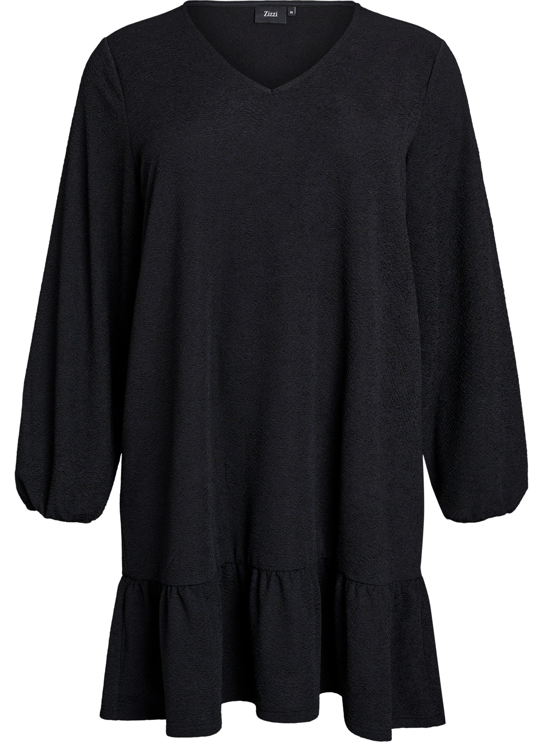 Kort kjole med struktur og fll&aelig;sekant