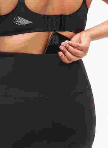 CORE, SUPER TENSION TIGHTS - Træningstights med lomme, Black, Model image number 2