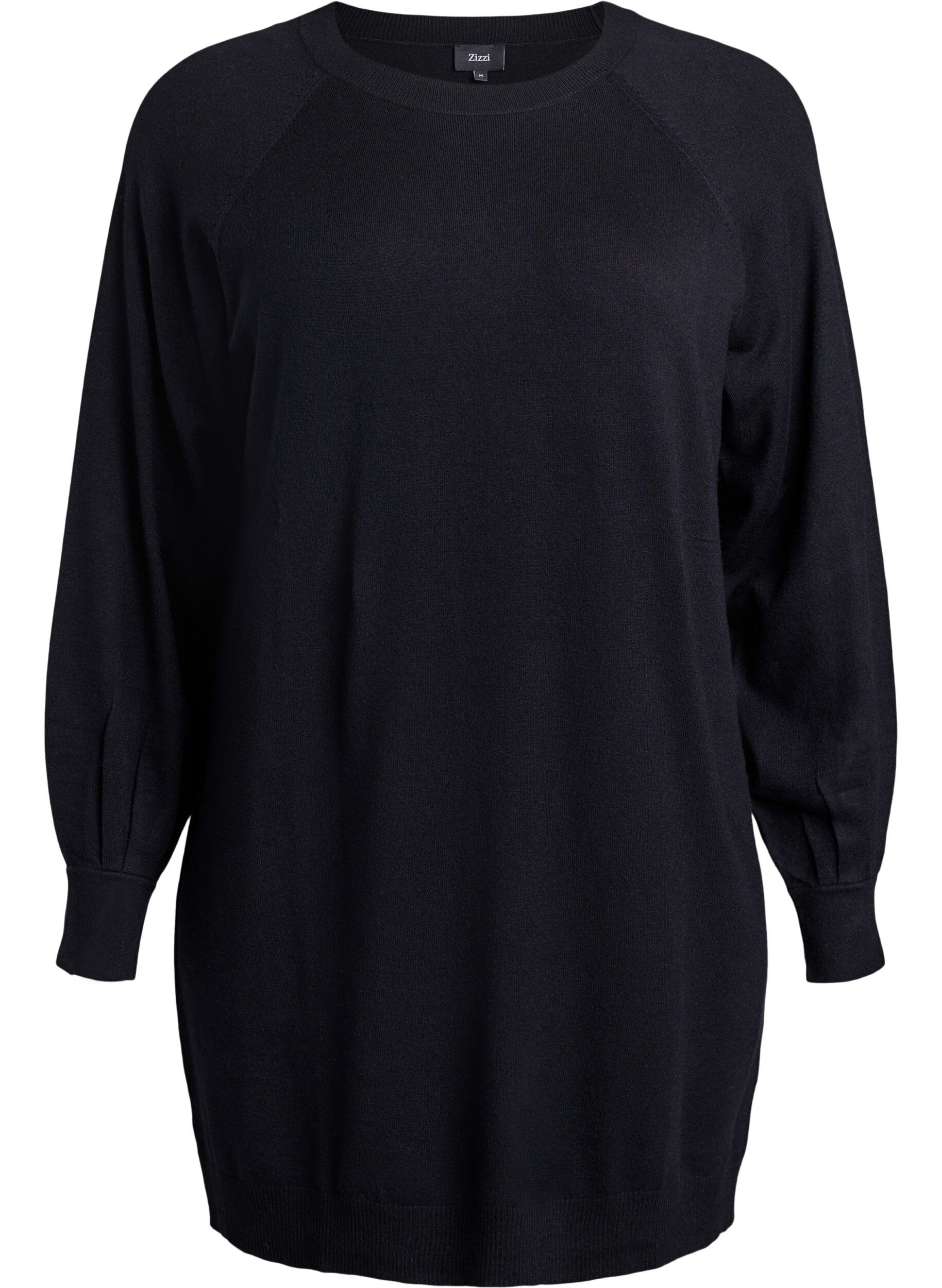 Kort strikkjole med raglan&aelig;rmer