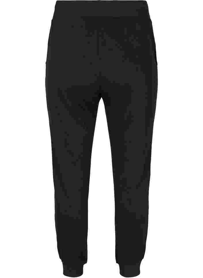 Ensfarvede træningsbukser med lommer, Black, Packshot image number 1