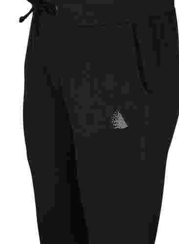 Ensfarvede træningsbukser med lommer, Black, Packshot image number 2