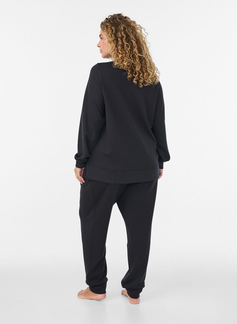 Lang&aelig;rmet jerseybluse med rund hals, Sort, Model image number 2