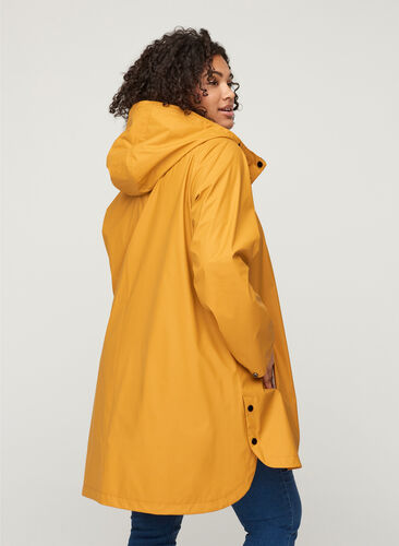 Regnjakke med hætte og lommer, Spruce Yellow, Model image number 1