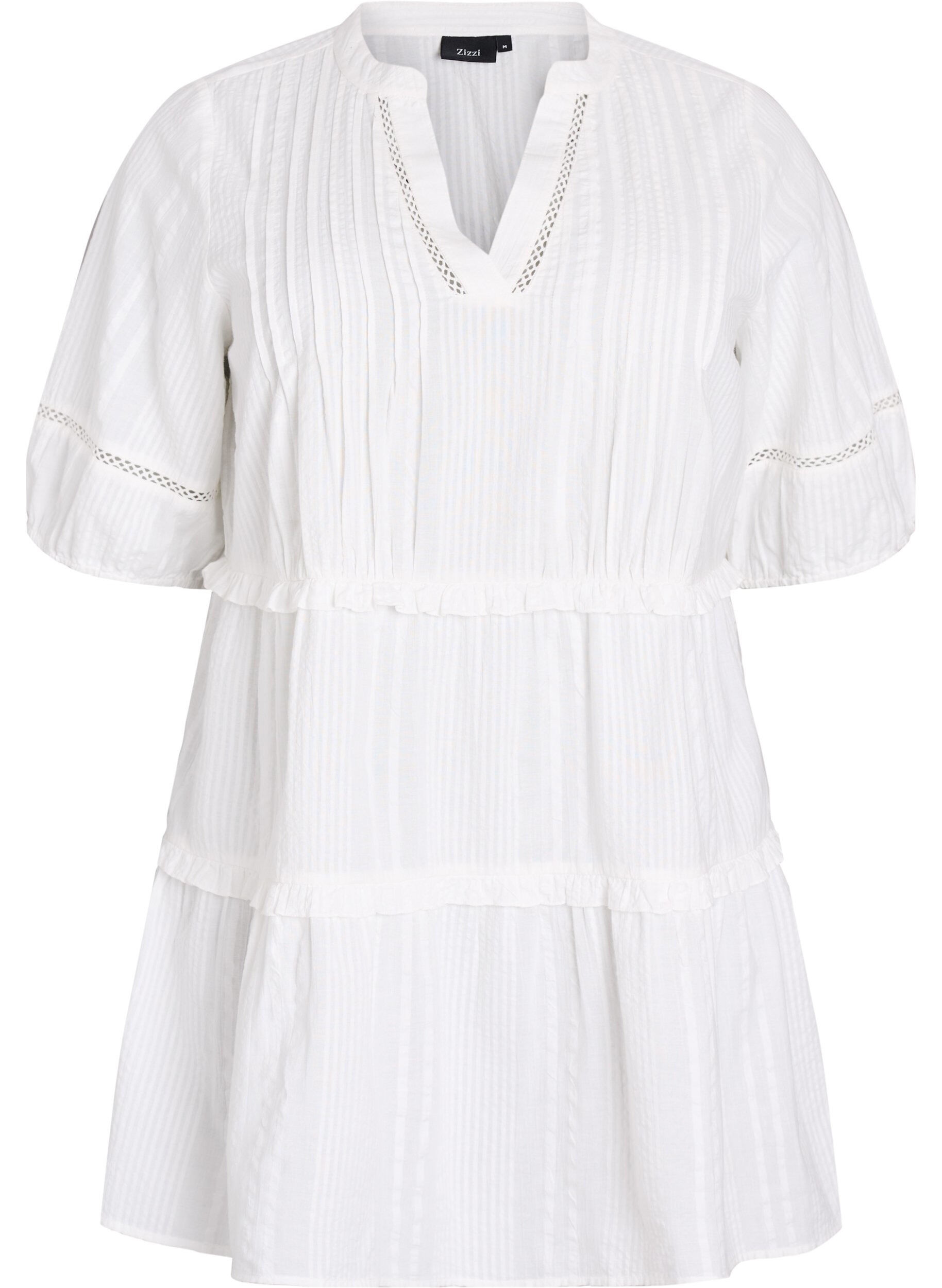 Tunika med fl&aelig;ser og A-facon