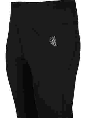 Træningstights med reflex og indvendig fleece, Black, Packshot image number 2