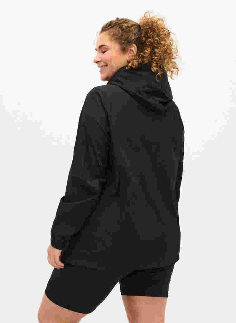 Sports anorak med hætte og lommer, Black, Model image number 1