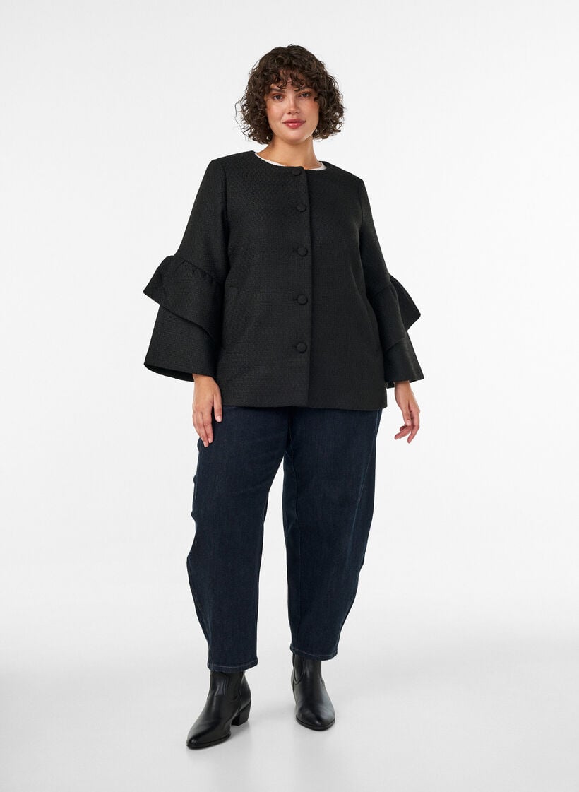 Boucl&eacute;jakke med fl&aelig;sedetaljer, Sort, Model image number 1