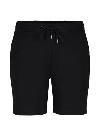 Løse shorts med bindesnøre og lommer