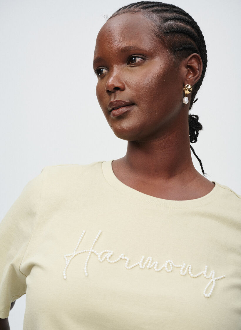 T-shirt i økologisk bomuld med perletekst, Beige, Image