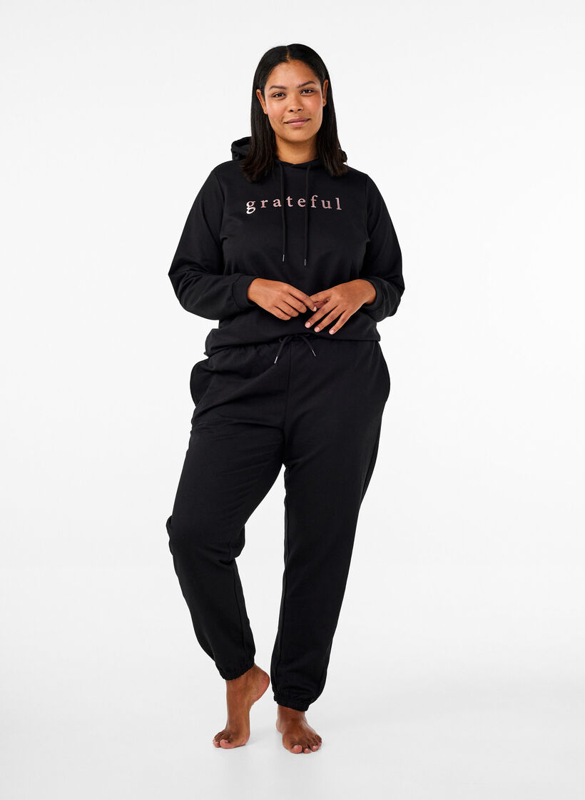 Sweatshirt med h&aelig;tte og print, Sort, Model image number 1