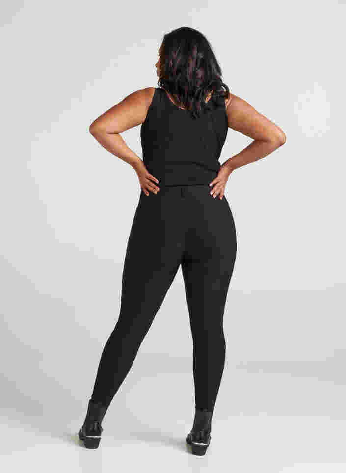 Tætsiddende bukser med lynlås detaljer, Black, Model image number 1