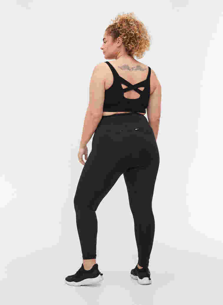 Cropped træningstights med tummy-tuck effekt, Black, Model image number 1