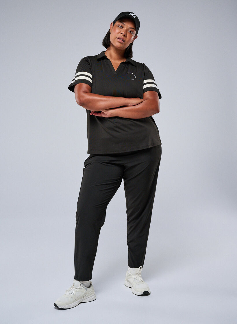 Lette tr&aelig;ningsbukser med lommer, Sort, Image image number 0