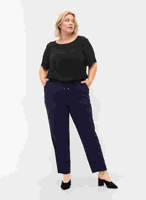 Bukser med lommer og elastikkant