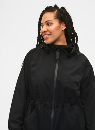 Funktionel frakke med lommer og hætte, Black, Model image number 2