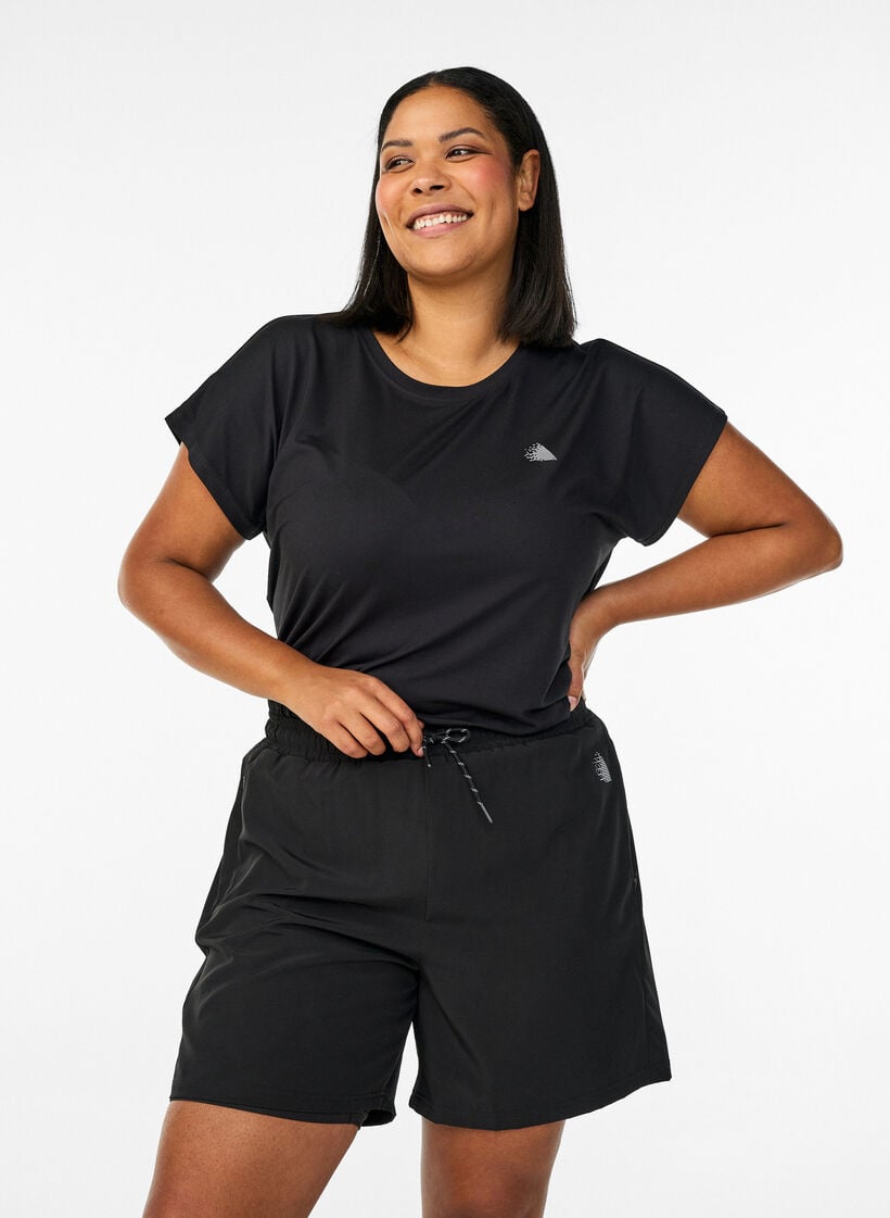 Tr&aelig;ningsshorts med indershorts og telefonlomme, Sort, Model