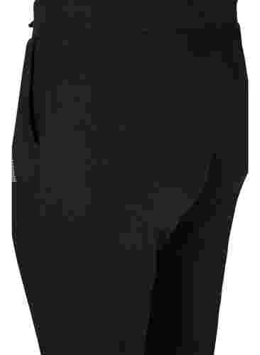 Ensfarvede træningsbukser med lommer, Black, Packshot image number 3