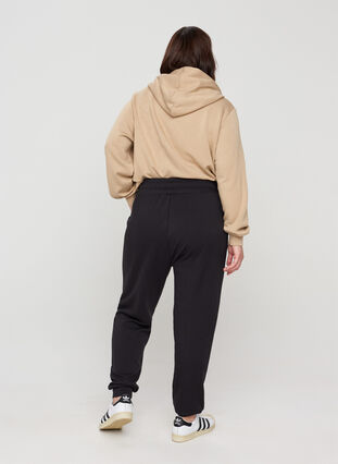 Sweatpants med lommer og snøre, Black, Model image number 1