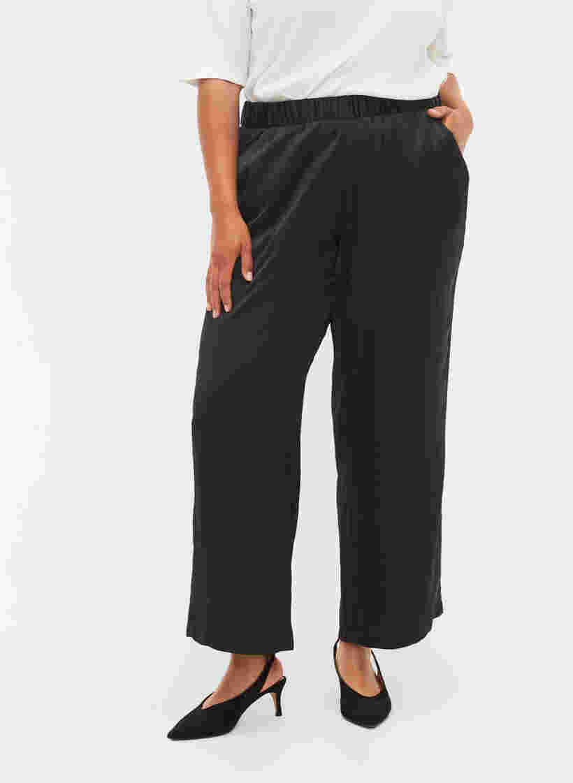 Løse bukser med lommer og elastikkant, Black, Model image number 2