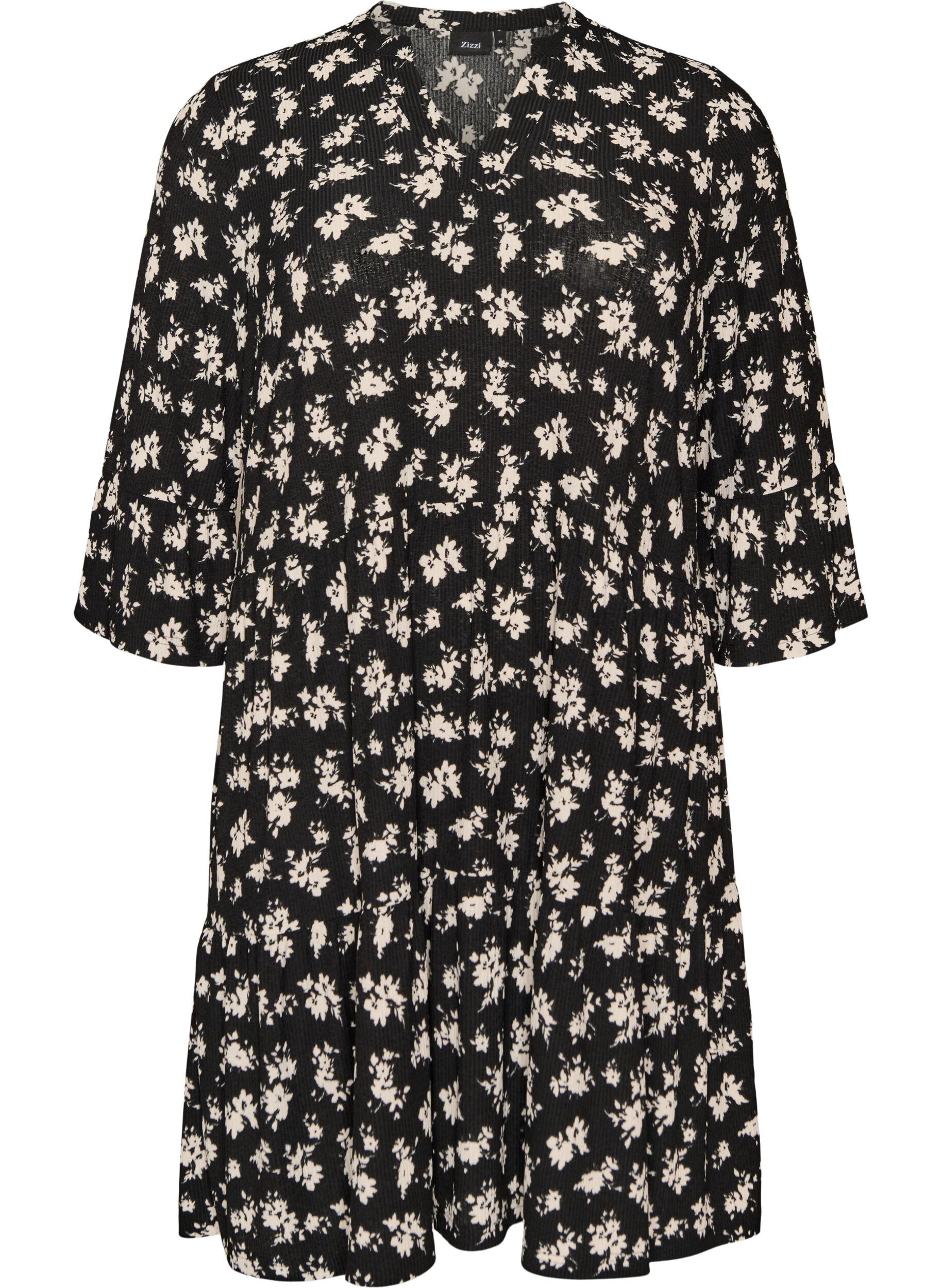 Kort jerseykjole med all-over print og A-form