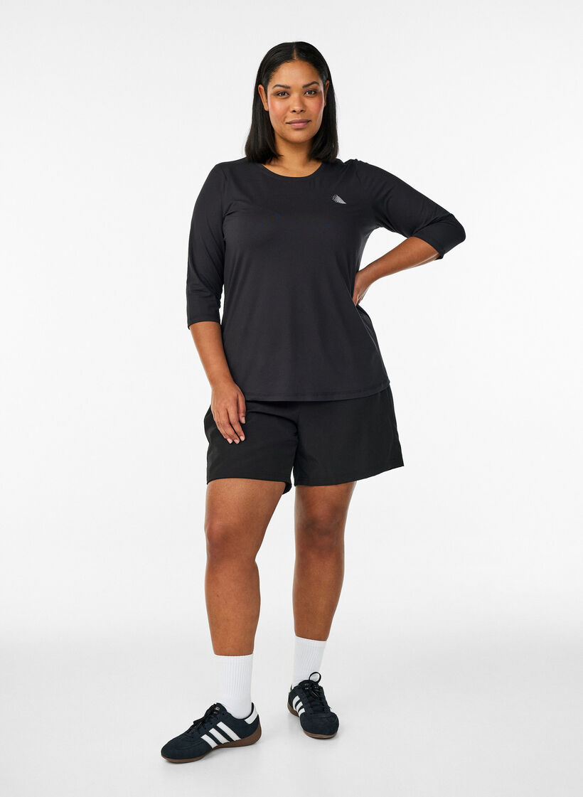 Tr&aelig;ningsbluse med 3/4 &aelig;rmer, Sort, Model image number 1