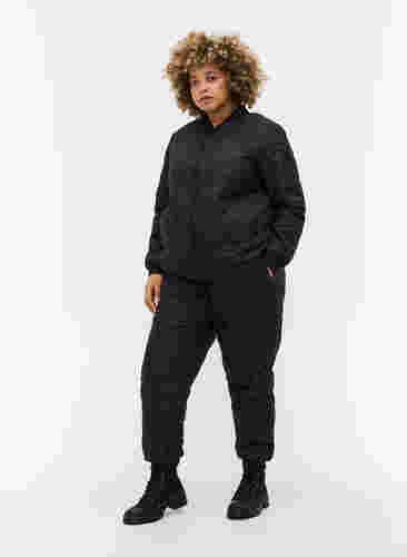 Quiltet 2-i-1 jumpsuit med lommer, Black, Model image number 3