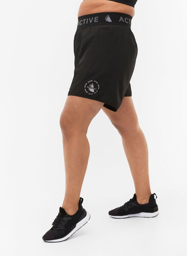 Trænings shorts med baglomme, Black, Model image number 0