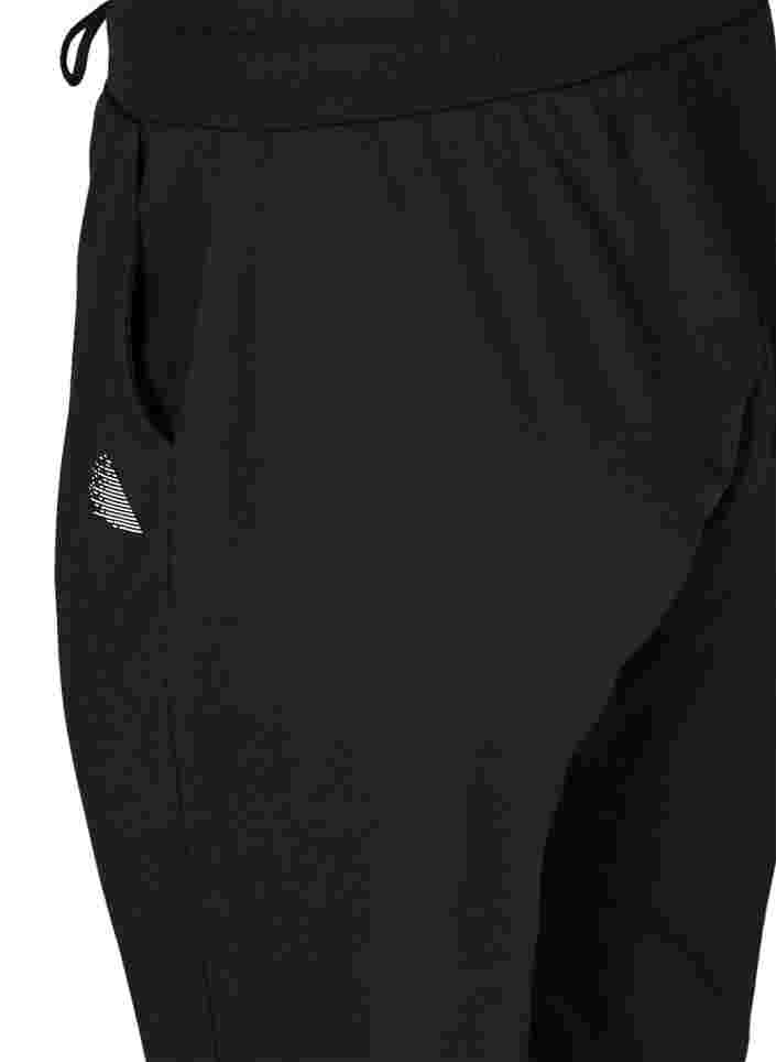 Løse træningsbukser med lommer, Black, Packshot image number 3