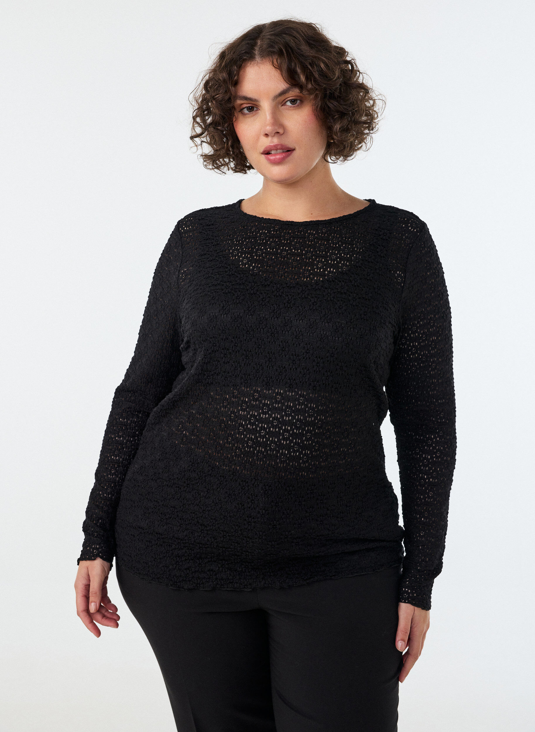 Bluse med hulm&oslash;nster og lange &aelig;rmer, Sort, Model