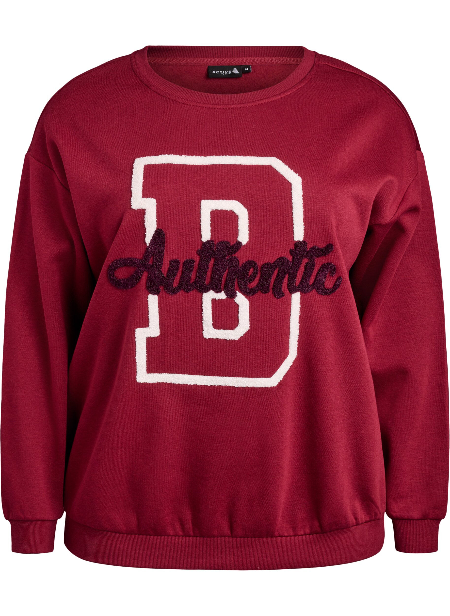Sweatshirt med tekst i frott&eacute;