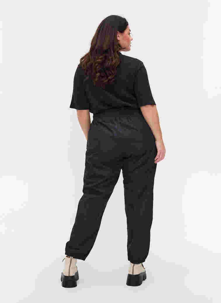 Regnbukser med elastik og snøre, Black, Model image number 1
