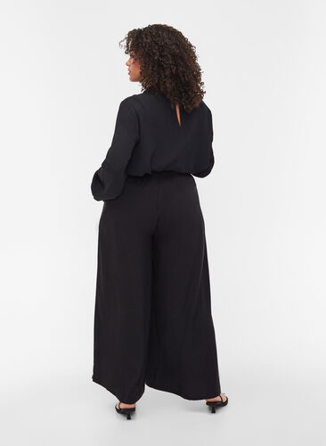 Ensfarvede viskose bukser med vidde, Black, Model image number 1