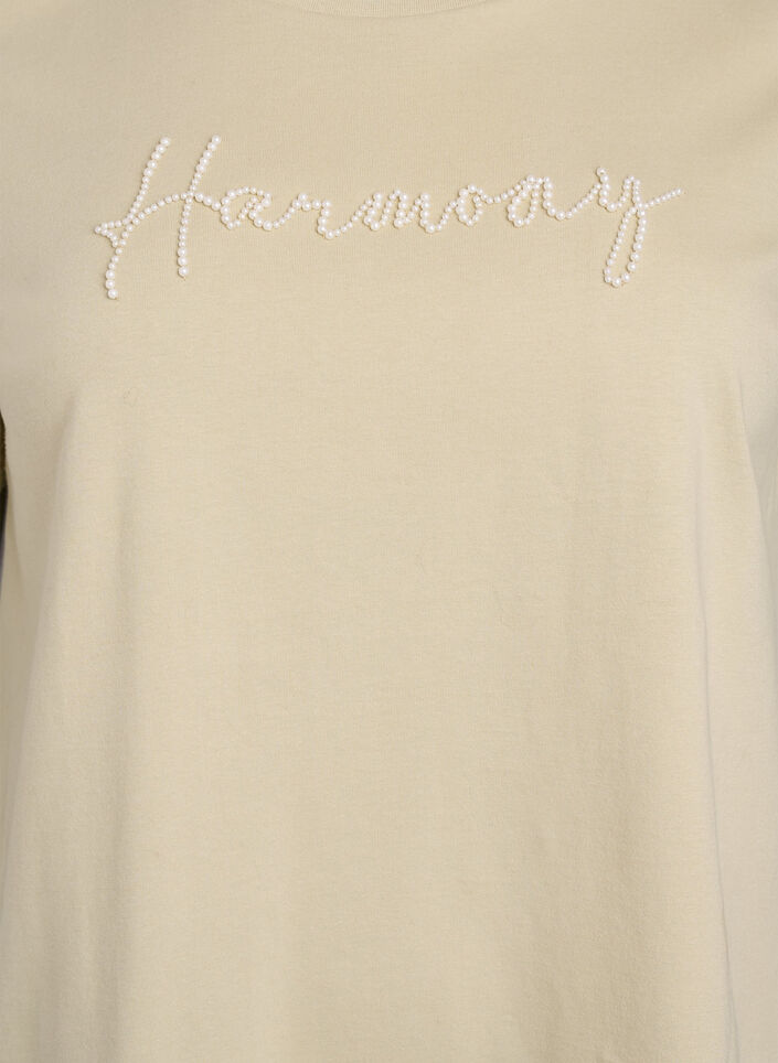 T-shirt i økologisk bomuld med perletekst, Beige, Packshot