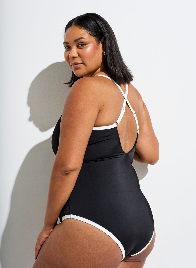 Sports badedragt med kontrastkanter og krydsede stropper, Sort, Model image number 2