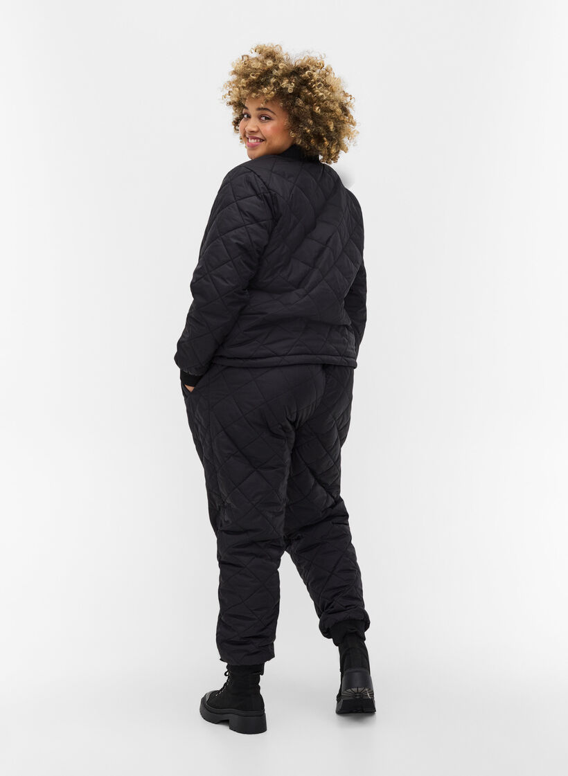 Quiltet 2-i-1 jumpsuit med lommer, Black, Model image number 0