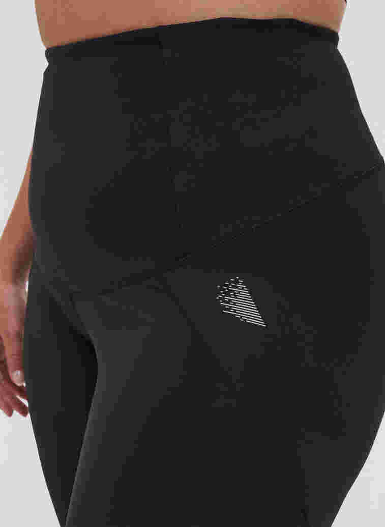 Cropped træningstights med tummy-tuck effekt, Black, Model image number 3