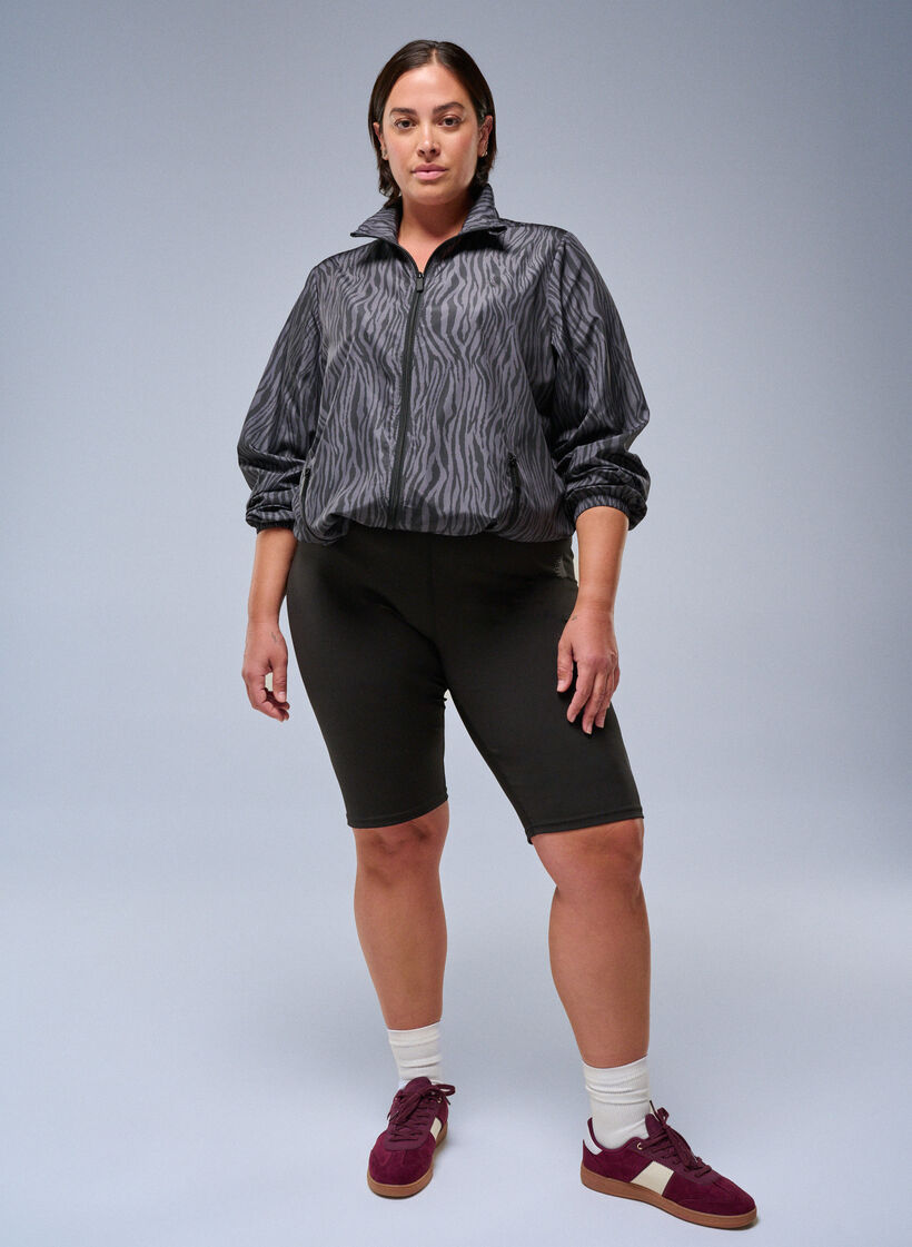 Lange tætsiddende træningsshorts, Sort, Image image number 0