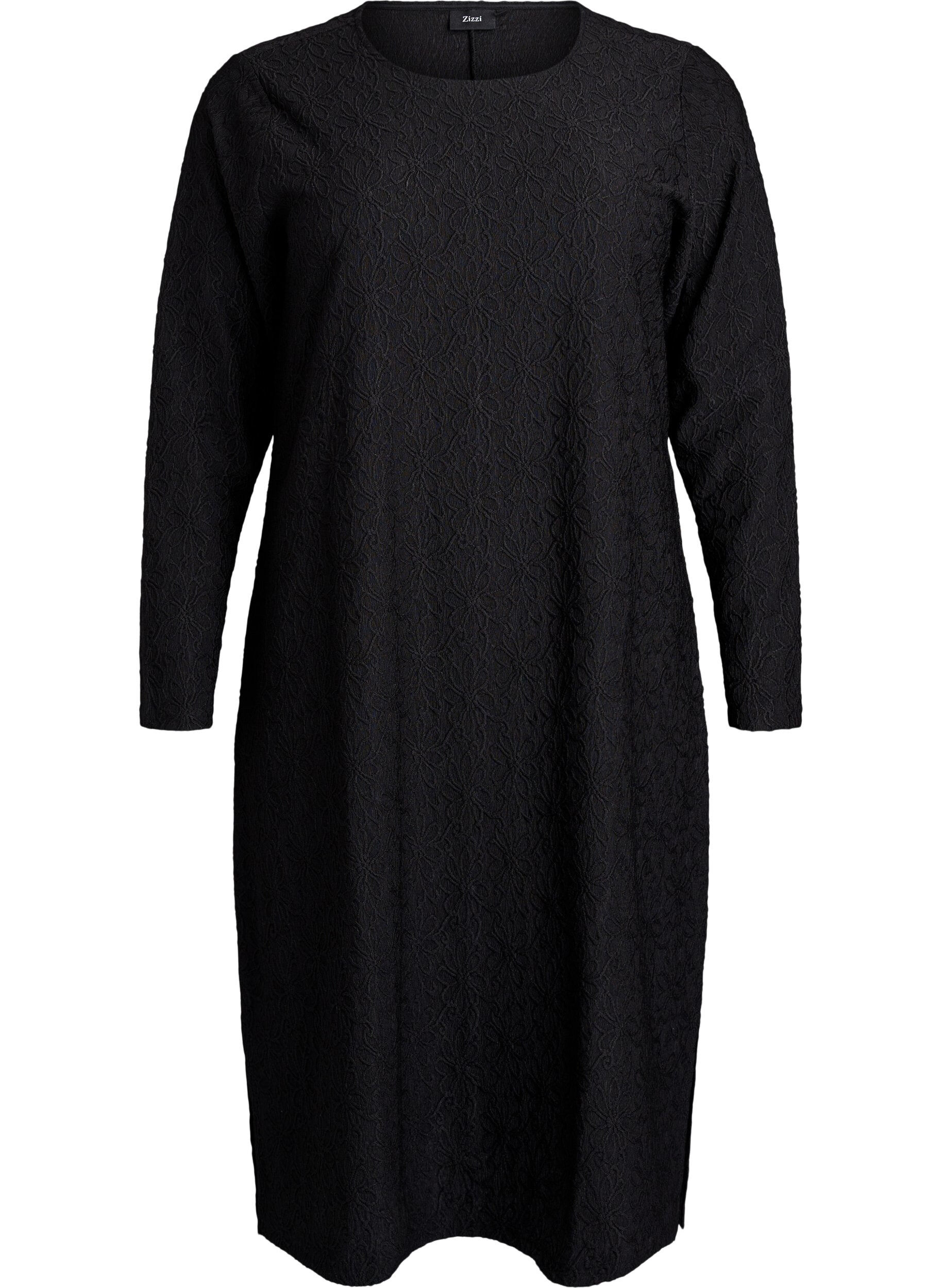 Kjole med blomsterstruktur og lange &aelig;rmer