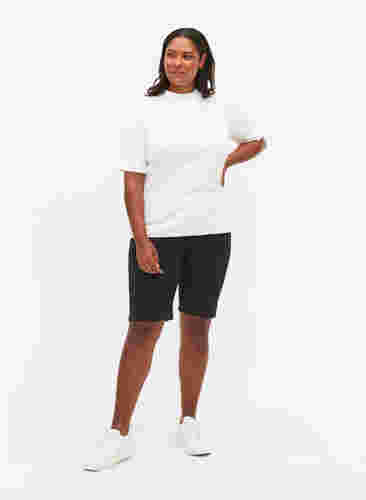 Tætsiddende shorts med baglommer, Black, Model image number 3