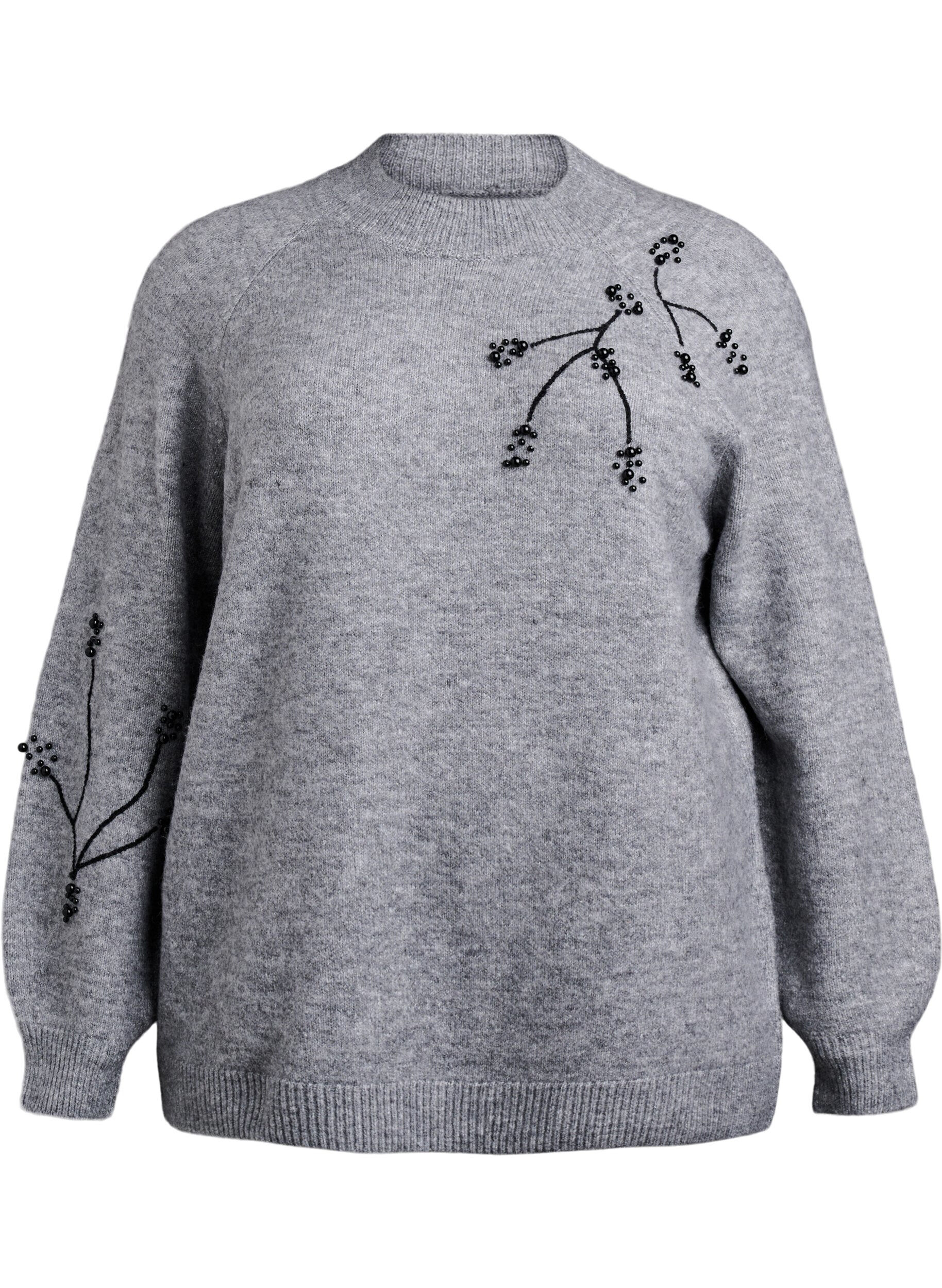 Strikbluse med perlebroderi