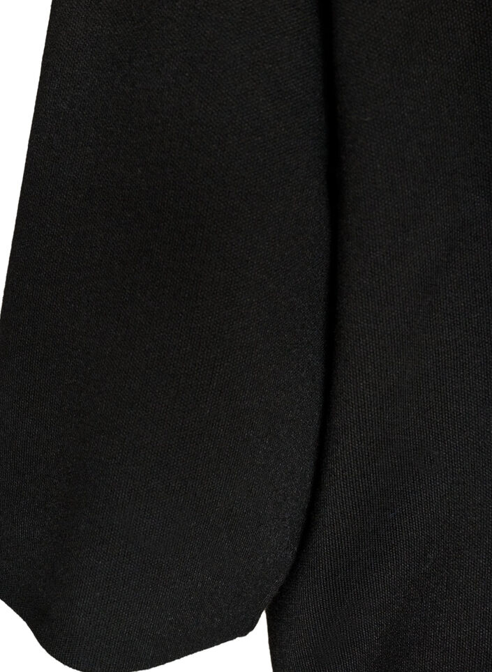 Strikbluse i viskoseblanding med rullekrave, Sort, Packshot image number 3
