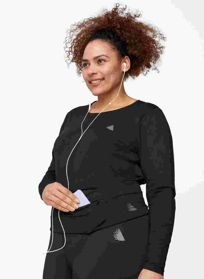 Løbebælte med lommer og lynlåse, Black, Model image number 1