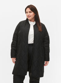 Lang quiltet jakke med lommer og lynlås, Black, Model