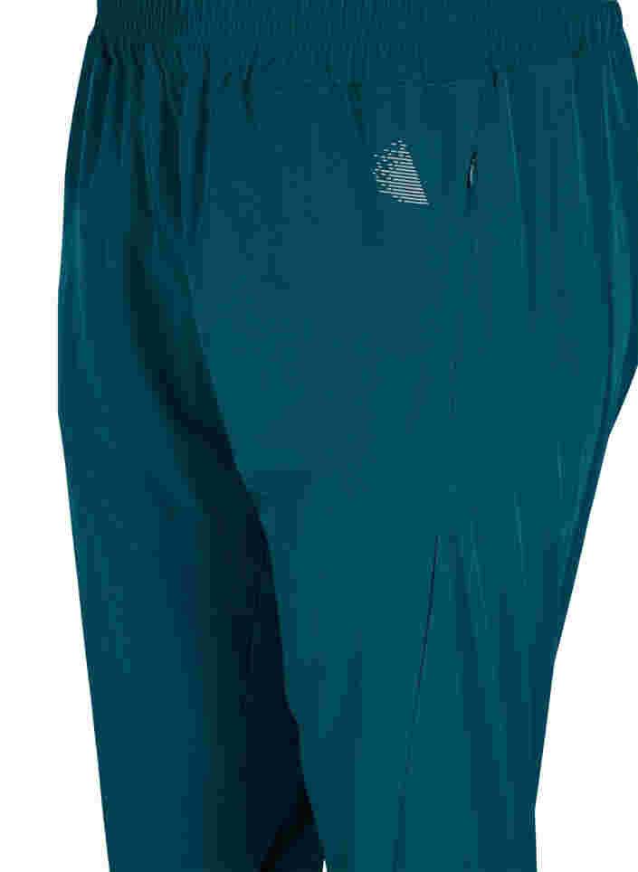 Løse træningsbukser med lommer, Deep Teal, Packshot image number 2