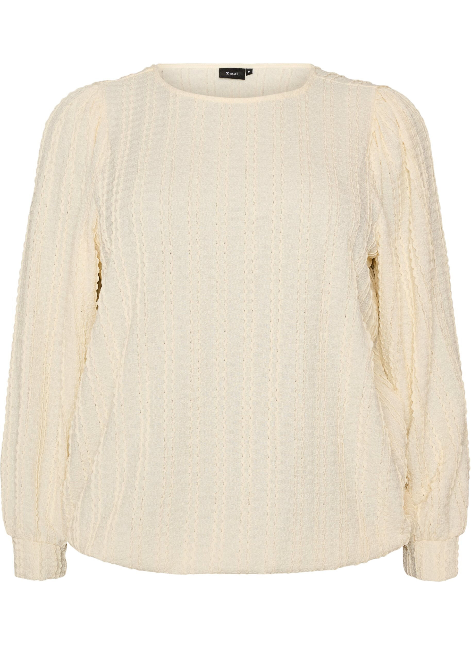 Jerseybluse med struktur og ballonform