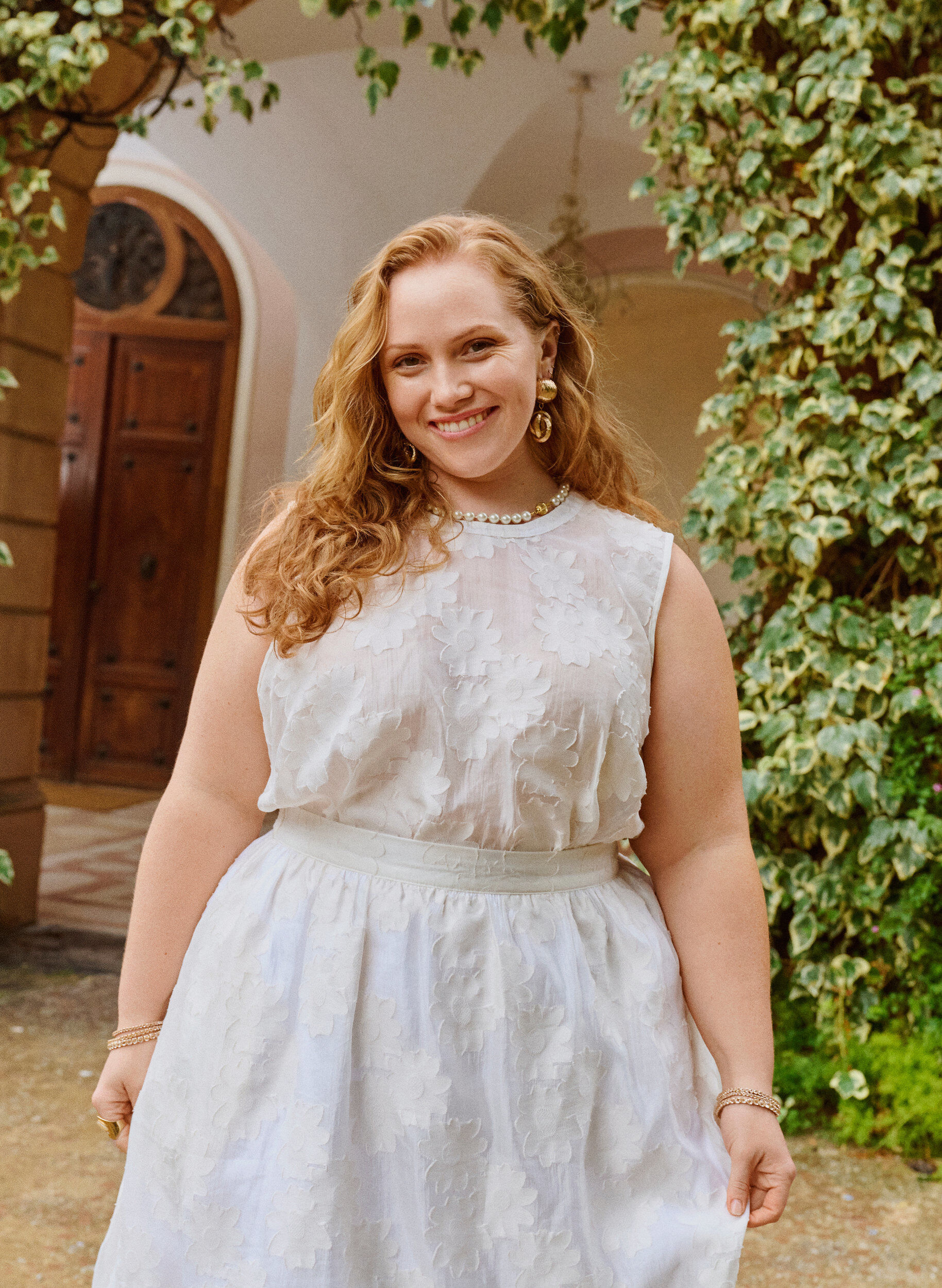 &AElig;rmel&oslash;s top i jacquard med blomsterstruktur